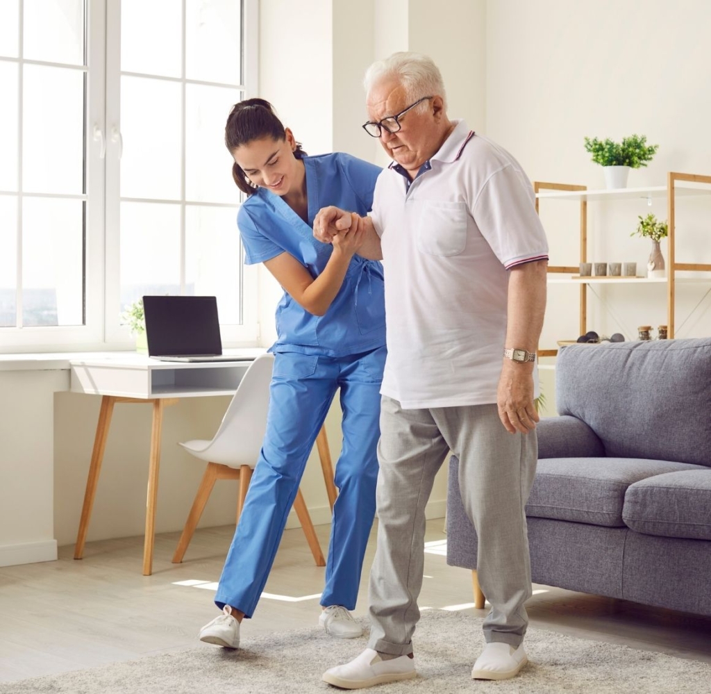 elderly getting assistance with walking